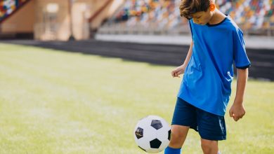 kid play soccer